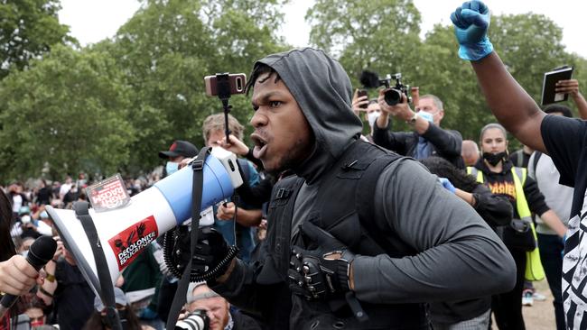 Your shout: Actor John Boyega revs up the crowd at a Black Lives Matter protest in Hyde Park. Picture: Getty Images