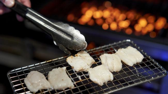 Grilling the ocean jacket cheeks. Picture: Sam Roberts