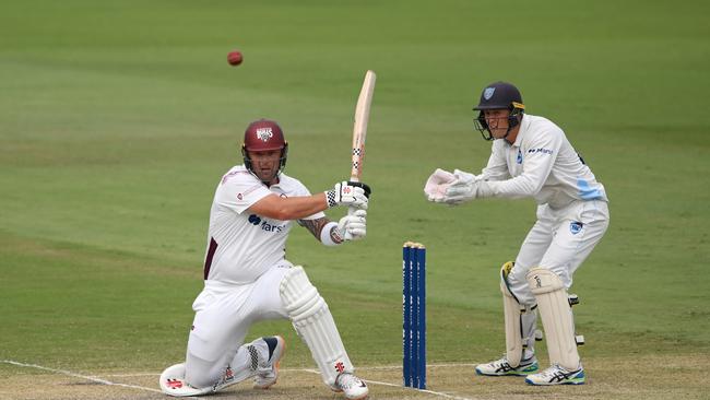 BRISBANE, AUSTRALIA - MARCH 13: Ben McDermott of Queensland plays a shot during the Sheffield Shield match between Queensland and New South Wales at Allan Border Field, on March 13, 2024, in Brisbane, Australia. (Photo by Matt Roberts/Getty Images)