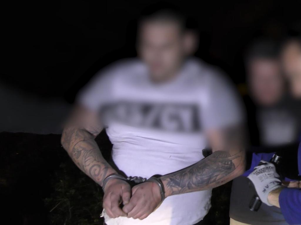 Scott William Berns being arrested after a vehicle interception along Nambour Connection Rd, Woombye in 2016.