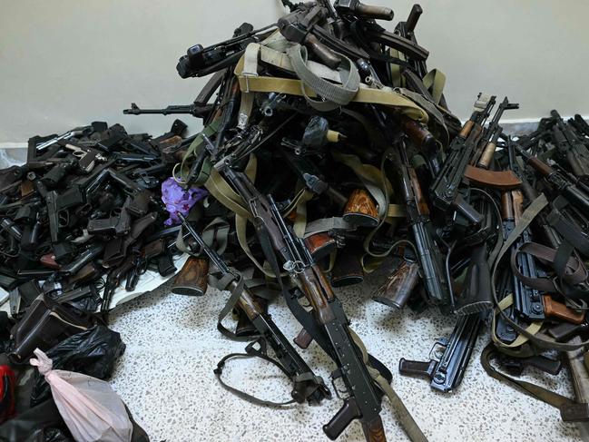 Firearms handed over to Syria's new authorities, pile up as Syrian soldiers, police and a some civilians surrender their weapons and register with the authorities. Picture: AFP