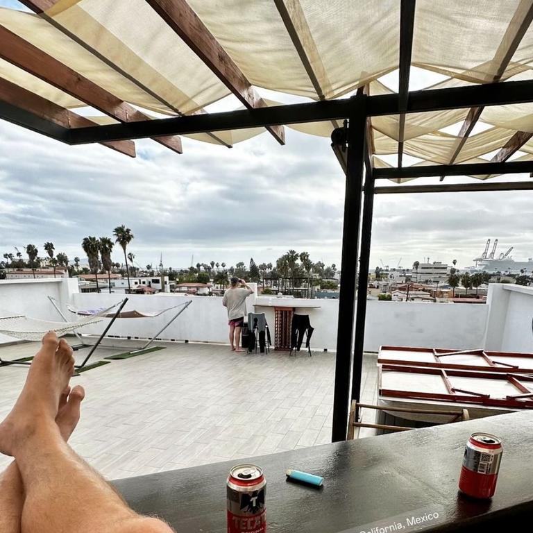 Callum shared a picture from a rooftop, where he was enjhoying a beer