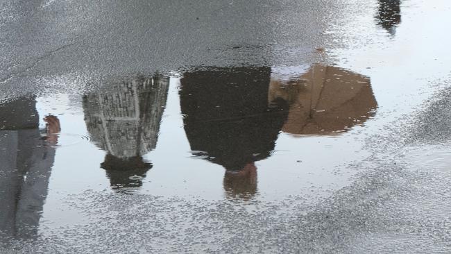 Rain didn’t dampen the spirits at the Geelong Cup. Picture: Mark Wilson