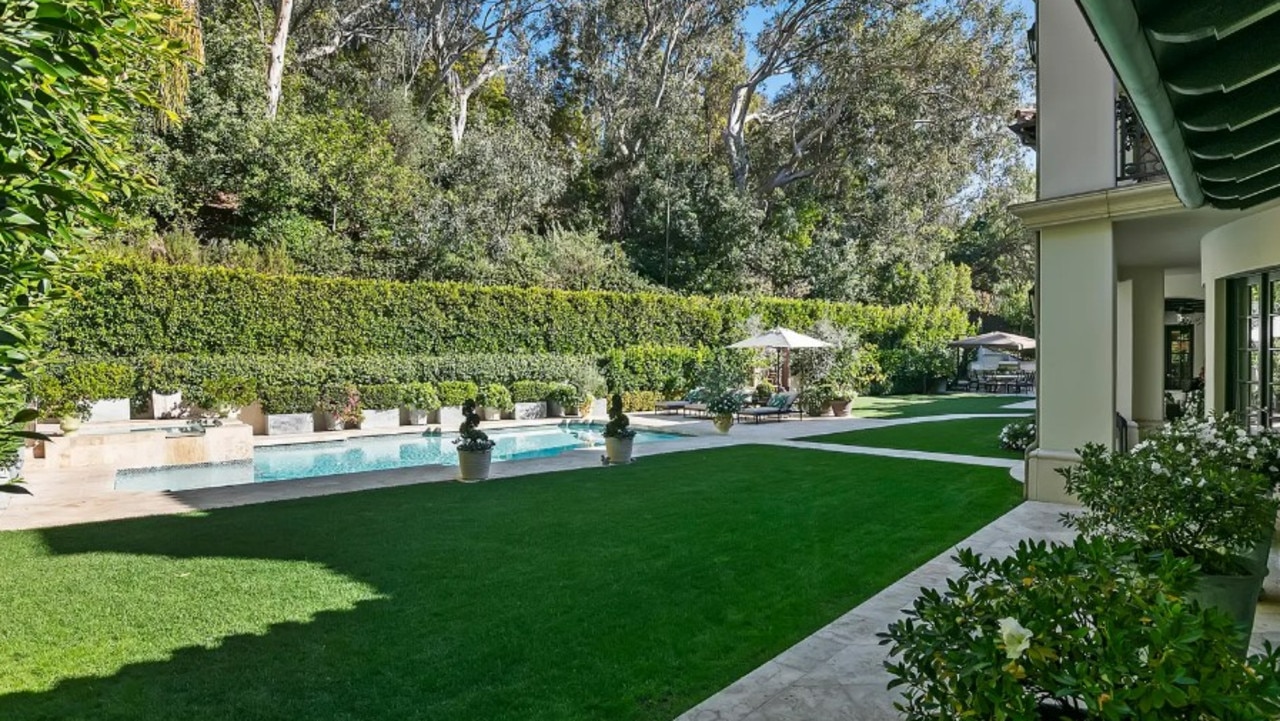 The manicured back yard with luxury pool. Picture: MLS/Realtor via Sotheby’s International Realty