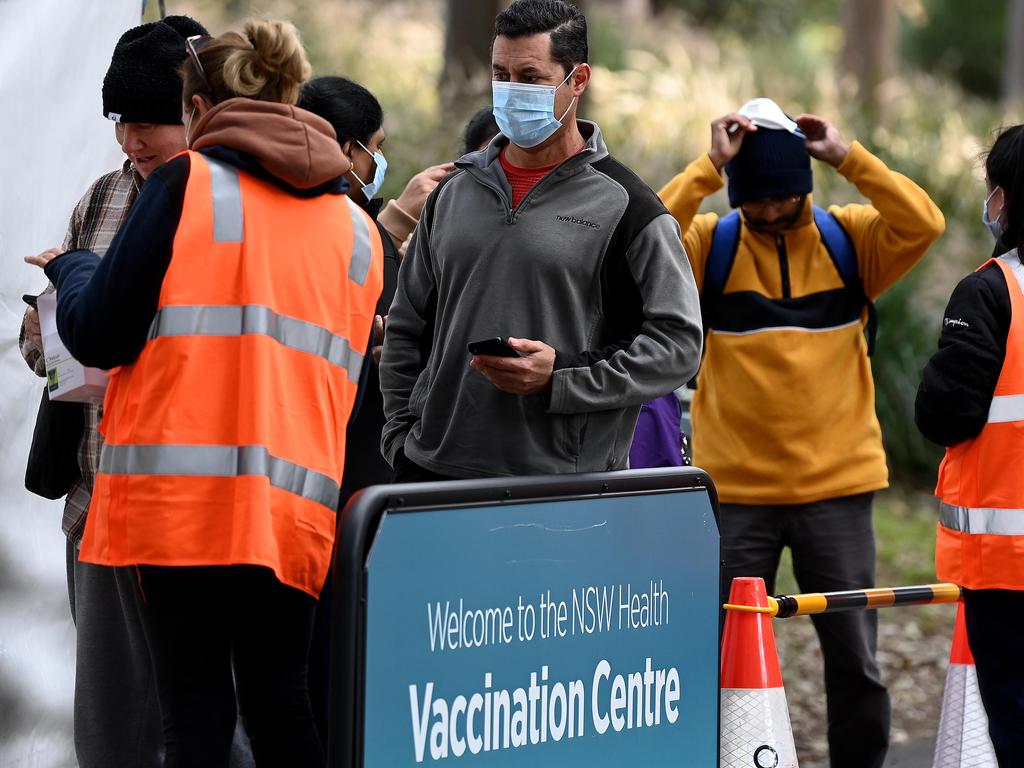 People line up to receive their Covid-19 vaccination at the NSW Health vaccination hub in Sydney. Picture: NCA NewsWire/Bianca De Marchi