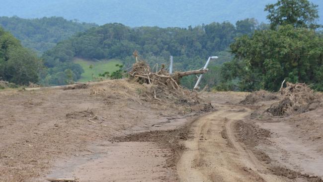 Many power poles were smashed when Daintree River flooded. Picture: Bronwyn Farr