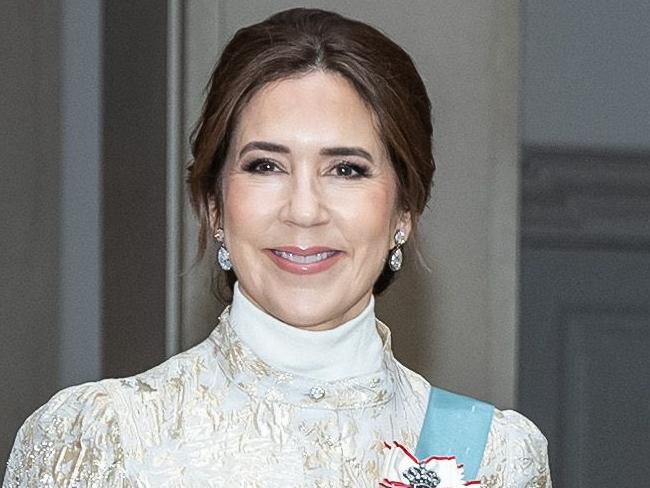 Denmarks Queen Mary and King Frederik X arrives at The Royal Couple's New Year's Reception for accredited Diplomats to Denmark at Christiansborg Palace in Copenhagen on January 6, 2025.  (Photo by Emil Nicolai Helms / Ritzau Scanpix / AFP) / Denmark OUT