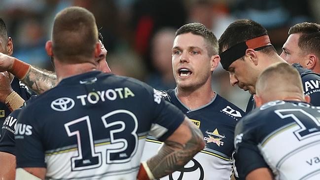 SYDNEY, AUSTRALIA - APRIL 03: Scott Drinkwater of the Cowboys talks to team mates after conceding a try during the round four NRL match between the Cronulla Sharks and the North Queensland Cowboys at Netstrata Jubilee Stadium, on April 03, 2021, in Sydney, Australia. (Photo by Mark Metcalfe/Getty Images)