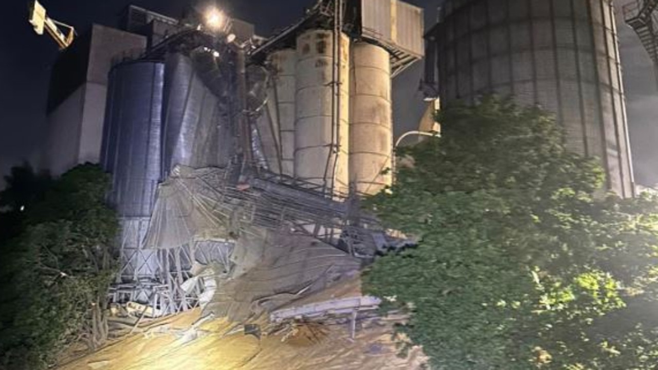 Dozens evacuated after two silos collapse, third at risk