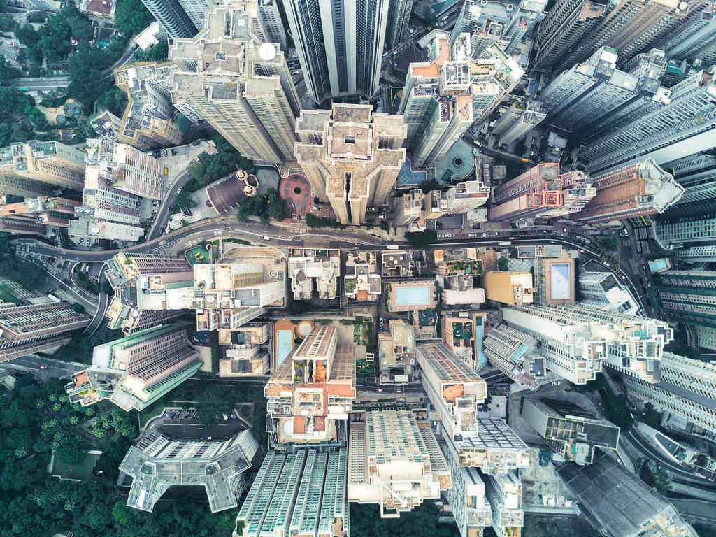 Buildings Forest. Photographer: Songshen Jiang Year: 2018 “I wanted to take some different photographs and Hong Kong is full of high buildings. It is difficult to express it on the ground and I thought it would be funny to change the angle of the view. So I use my drone, launching it from the mountain, and took this picture. From this angle, we can see that the buildings in Hong Kong are very high and serried.” Copyright: © Songshen Jiang, China, Open, Architecture (Open), 2018 Sony World Photography Awards