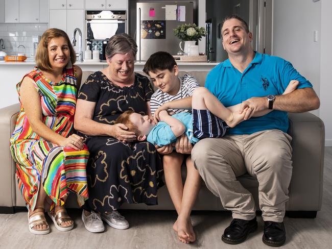 Qweekend - Scott Dietrich and his family purpose built their new home to cater for the needs of their three-generational family. Scott and Megan with children Ellis, 11 and Max, 3 and Lyn (Megan's mum). Pic Mark Cranitch.