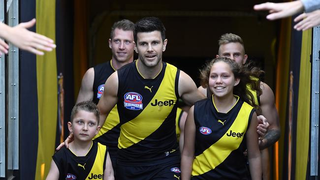 Richmond captain Trent Cotchin leads his team out onto the field during the 2019 AFL Grand Final.