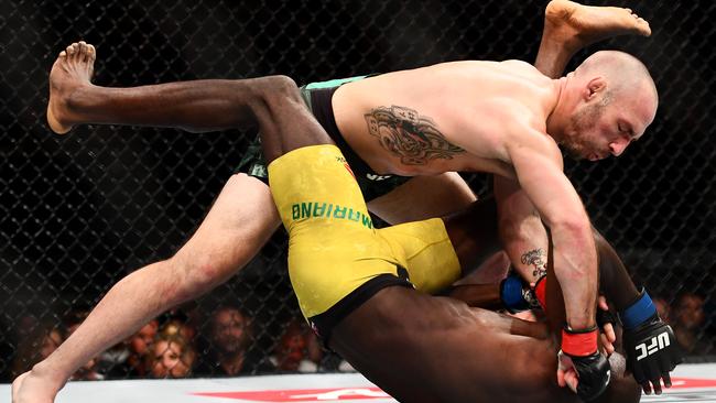 Lando Vannata of the United States punches Marcos Mariano of Brazil during their lightweight bout. Picture: Quinn Rooney/Getty Images