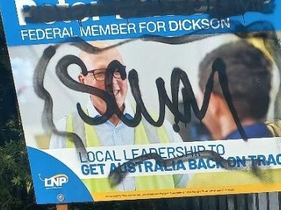 Vandalism on corflutes in Peter Dutton's electorate.