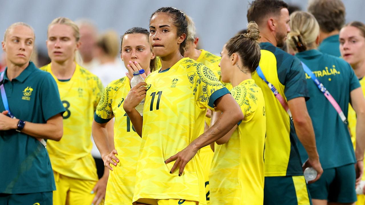 MARSEILLE, FRANCE – JULY 25: Players from Team Australia show dejection after the Women's group B match between Germany v Australia during the Olympic Games Paris 2024 at Stade de Marseille on July 25, 2024 in Marseille, France. (Photo by Alex Livesey/Getty Images)