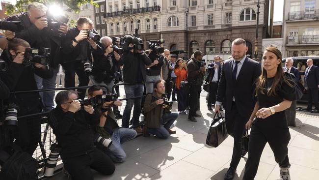 Coleen and Wayne Rooney arrive at court. Picture: Getty Images.