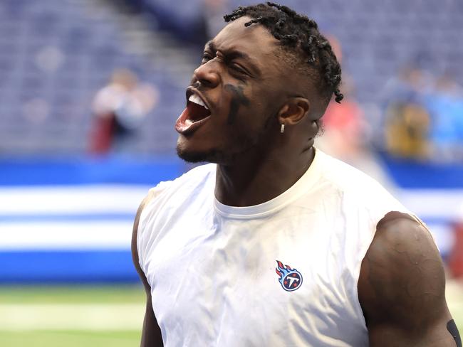 INDIANAPOLIS, INDIANA - OCTOBER 31: A.J. Brown #11 of the Tennessee Titans celebrates as he walks off the field after a 34-31 win over the Indianapolis Colts in overtime at Lucas Oil Stadium on October 31, 2021 in Indianapolis, Indiana. (Photo by Justin Casterline/Getty Images)