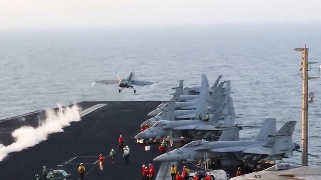 An aircraft launches from the USS Harry Truman in the Red Sea before air strikes in Sanaa, Yemen. Picture: US Navy via AP.