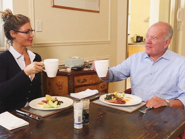 Sunday Night reporter Mike Willesee eats his first paleo meal with Pete Evans' wife Nicola Robinson. Picture: Channel 7