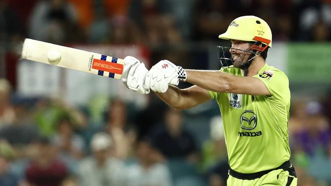 Ben Cutting playing for the Thunder bats during a Big Bash League match in Canberra. Picture: Darrian Traynor/Getty Images.