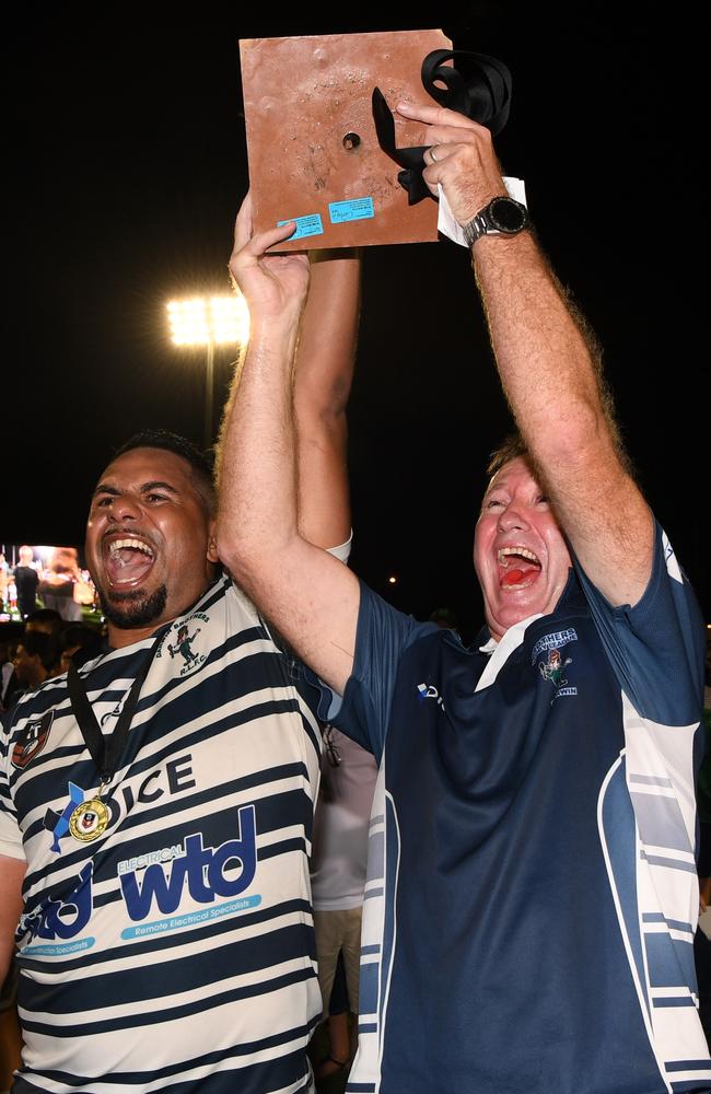 Aaron Pollard and Leon Cleal lifting the 2020 NRL NT premiership trophy. Picture: Katrina Bridgeford