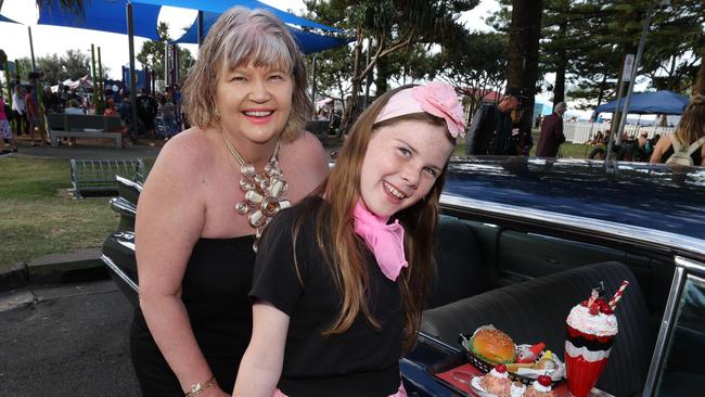 Joedi Lawrence and Kaylee Boyland, 11, at Cooly Rocks On festival. Picture: Annette Dew