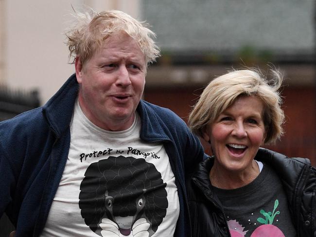 Image ©Licensed to i-Images Picture Agency. 20/02/2018. London, United Kingdom. Boris Johnsons Running with Julie Bishop. The Foreign Secretary Boris Johnson out running in central London with Australian politician Julie Bishop, she is serving as the Minister for Foreign Affairs since 2013, and the Deputy Leader of the Liberal Party since 2007, in their save the pangolin T-shirts.  Picture by Andrew Parsons / i-Images