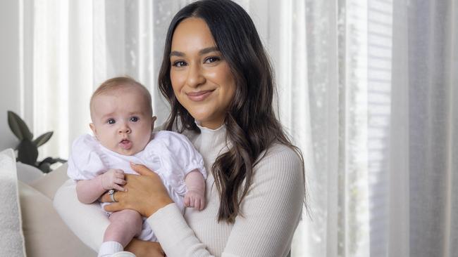 Natalie Docherty, wife of Carlton star Sam Docherty, with their baby, Ruby, who turned one this month. Picture: Wayne Taylor