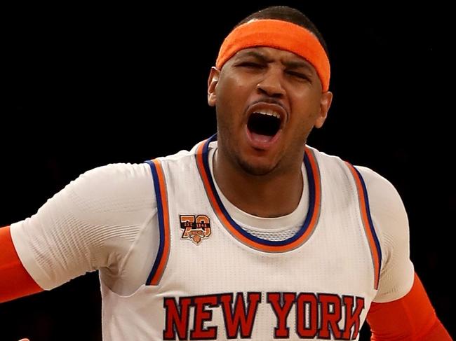 NEW YORK, NY - FEBRUARY 12: Carmelo Anthony #7 of the New York Knicks reacts after he is called for a foul in the fourth quarter against the San Antonio Spurs at Madison Square Garden on February 12, 2017 in New York City. NOTE TO USER: User expressly acknowledges and agrees that, by downloading and or using this Photograph, user is consenting to the terms and conditions of the Getty Images License Agreement   Elsa/Getty Images/AFP == FOR NEWSPAPERS, INTERNET, TELCOS & TELEVISION USE ONLY ==