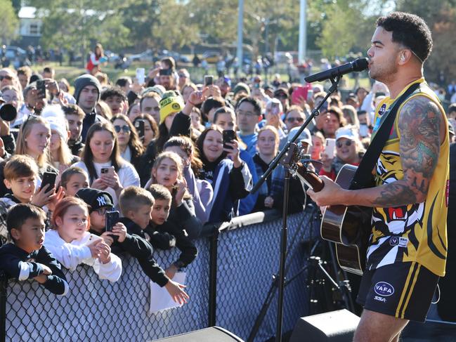 Sebastian plays a mini gig at half time. Picture: David Crosling