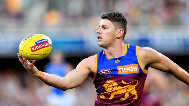 Lions captain Dayne Zorko shows his skill during his side’s easy weekend win over the Suns. (AAP Image/Darren England)