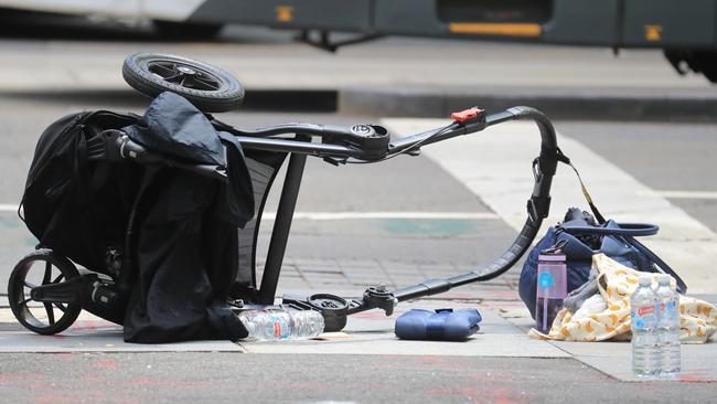 A pram up-ended on the road. Picture: Alex Coppel