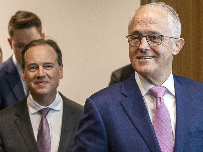 Prime Minister Malcolm Turnbull and Minister for Health Greg Hunt arrives to a press conference following a tour of the Peter McCallum Cancer Centre in Melbourne, Monday, July 16, 2018. (AAP Image/Daniel Pockett) NO ARCHIVING