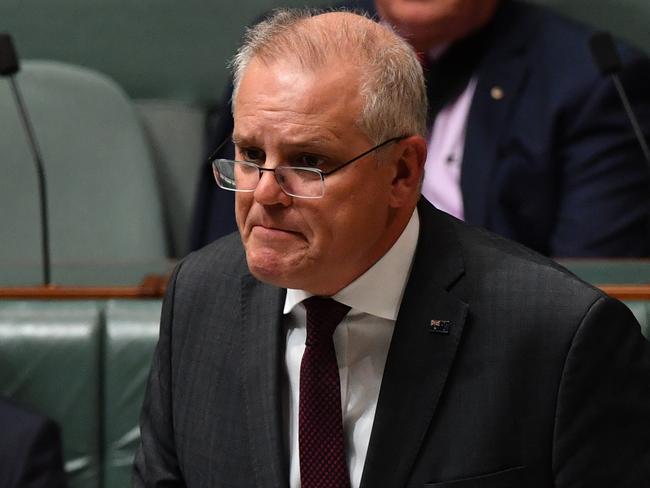 CANBERRA, AUSTRALIA - FEBRUARY 24: Treasurer Josh Frydenberg and Prime Minister Scott Morrison during Question Time in the House of Representatives at Parliament House on February 24, 2021 in Canberra, Australia. Prime Minister Scott Morrison has lost a working majority in parliament after the Member for Hughes Craig KellyÃ¢â¬â¢s resigned yesterday and moved to the crossbench, warning he is prepared to vote against the government. Mr KellyÃ¢â¬â¢s decision to quit the Liberal Party came after the Prime Minister demanded he stop spreading misinformation about COVID-19 and take action against his office manager, Frank Zumbo, who faces allegations of inappropriate behaviour. (Photo by Sam Mooy/Getty Images)