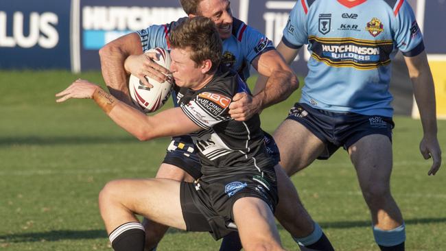 Matt Duggan for Clydesdales tackles Jaylan De Groot for Seagulls. Hostplus Cup, Western Cydesdales vs Tweed Seagulls. Saturday, March 18, 2023. Picture: Nev Madsen.