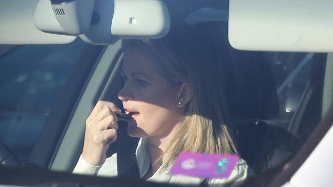 People doing stuff while driving on Sydney rd City bound .picture John Grainger