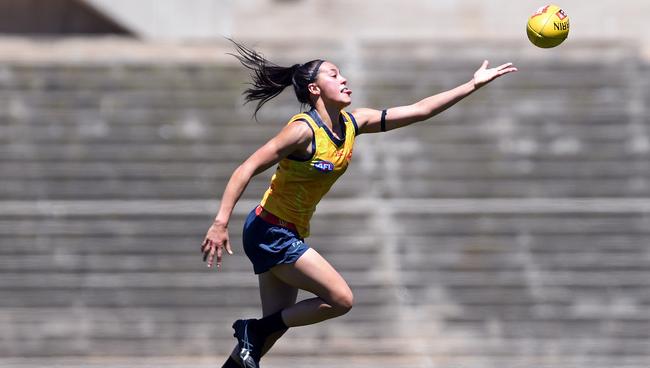 Adelaide Crows AFLW player Justine Mules at training at the now barren Football Park. With three teams, the club has now outgrown the venue. Picture: Tom Huntley