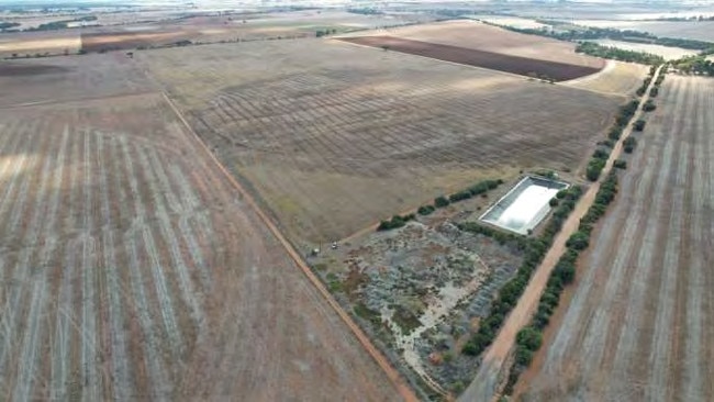 The site, seen from the air, where the large market garden would go.