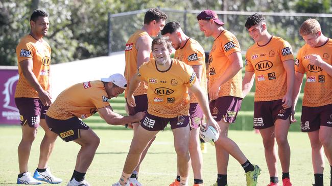 Going... Skipper Alex Glenn gets a firm hold of Corey Oates’ shorts during the captain’s run at Red Hill on Friday. Picture: Annette Dew