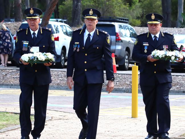 Mourners at the memorial service with full police honours for constables Rachel McCrow and Matthew Arnold at Brisbane Entertainment Centre. Picture: David Clark
