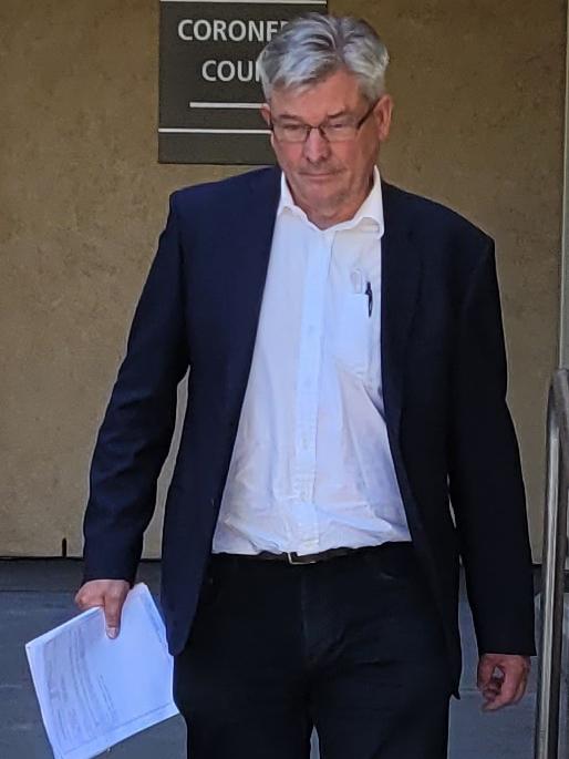 Royal Adelaide Hospital cardiothoracic surgeon Dr James Edwards leaves the Coroners Court after giving evidence in the inquest of Dennis Charles Jackson.