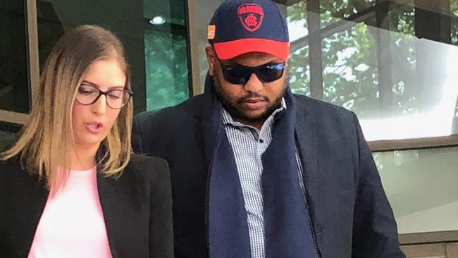 Mohamed Osmar Omar who allegedly defrauded the NDIS of more than $480,000 with his lawyer Giselle Nehma. Picture: Tessa Akerman