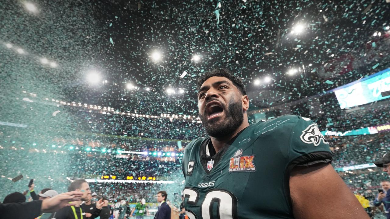 Jordan Mailata celebrates after shocking the Chiefs in the Super Bowl. (AP Photo/Doug Benc)