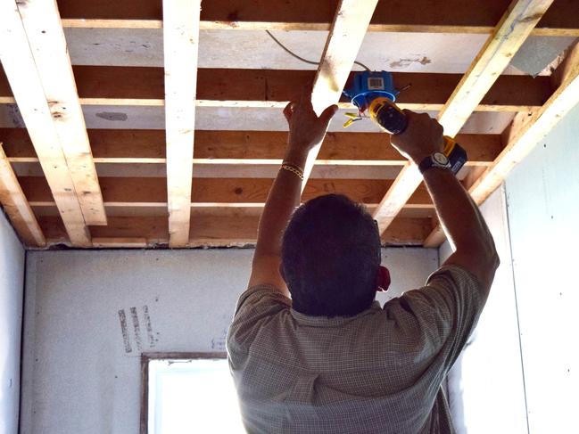 Tradie: ElectricianA behind the scenes look, mid reno Photo: istock