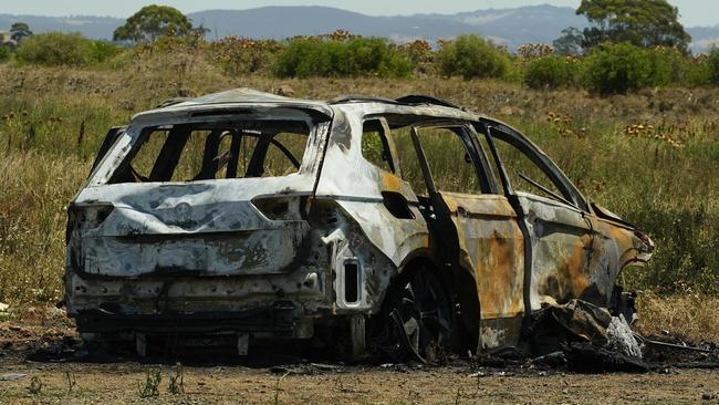 MELBOURNE AUSTRALIA - NewsWire Photos JANUARY 10, 2024: The getaway vehicle from a fatal shooting in Caroline Springs is seen torched on Beattys Road in Fraser Rise. Picture: NewsWire / Luis Enrique Ascui