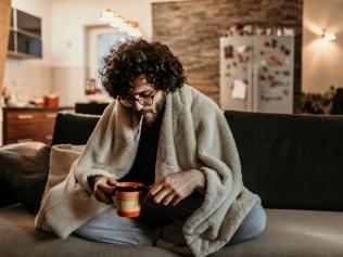 young man sick at home