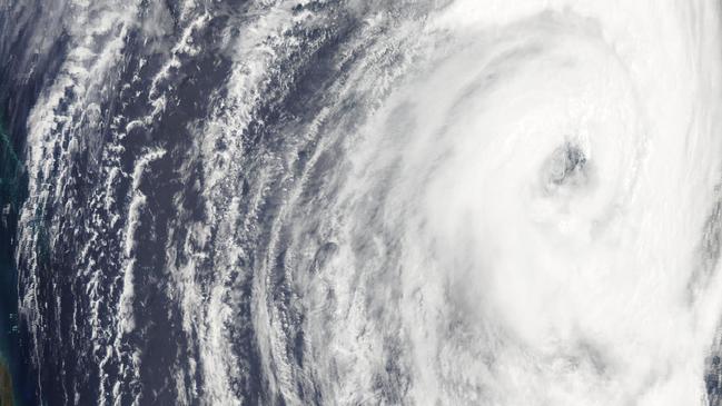 A satellite picture as tropical Cyclone Oma heads toward south East Queensland. Picture: NASA/Modia