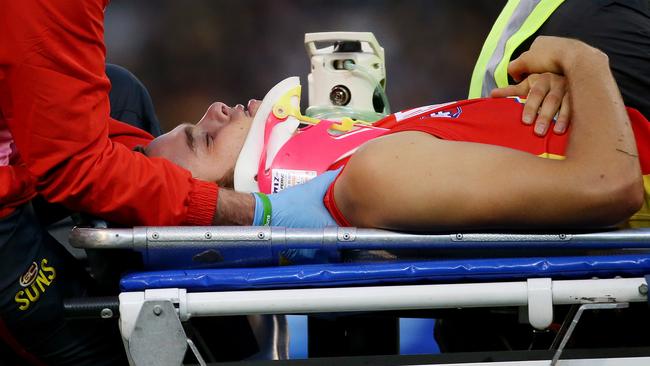 Kade Kolodjashnij is helped off the ground after he was concussed in 2016. Picture: Colleen Petch