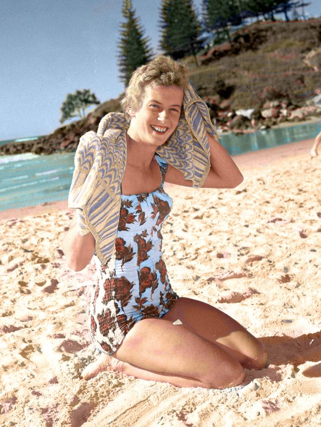 Betty relaxing on the beach at the Gold Coast in 1960. Picture: Ray Saunders.