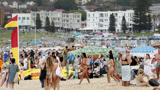 Bondi Beach was teeming with locals and tourists on Australia Day where the animosity towards the holiday seemed to be in keeping with its surroundings.